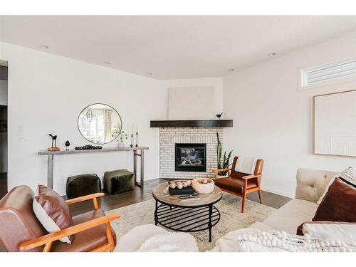 65 Auburn Springs Place Se, Calgary, AB - Indoor Photo Showing Living Room With Fireplace