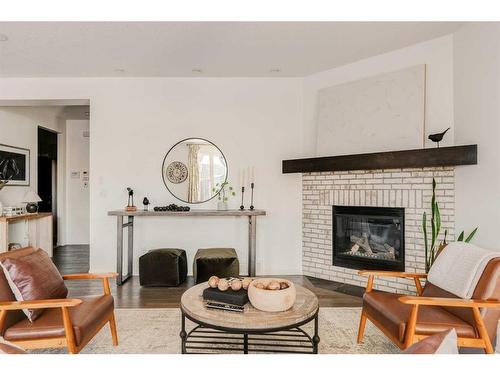 65 Auburn Springs Place Se, Calgary, AB - Indoor Photo Showing Living Room With Fireplace