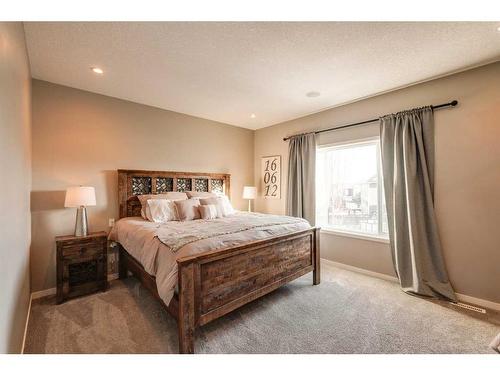 65 Auburn Springs Place Se, Calgary, AB - Indoor Photo Showing Bedroom