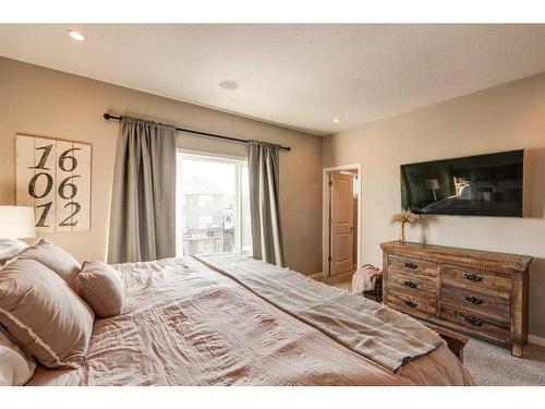 65 Auburn Springs Place Se, Calgary, AB - Indoor Photo Showing Bedroom