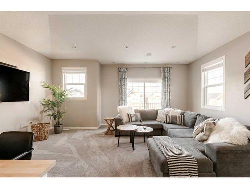 65 Auburn Springs Place Se, Calgary, AB - Indoor Photo Showing Living Room