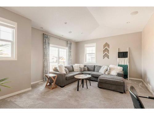 65 Auburn Springs Place Se, Calgary, AB - Indoor Photo Showing Living Room