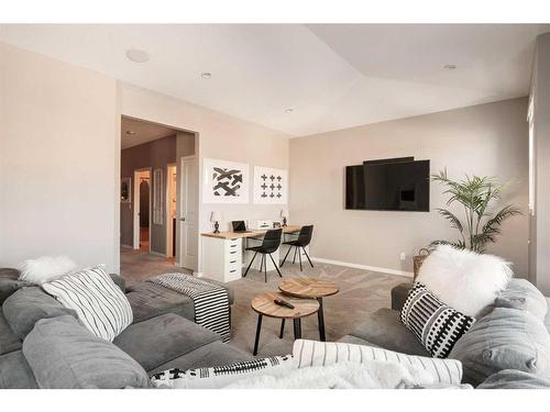 65 Auburn Springs Place Se, Calgary, AB - Indoor Photo Showing Living Room