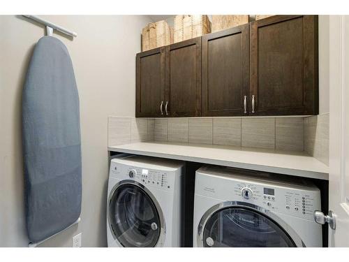 65 Auburn Springs Place Se, Calgary, AB - Indoor Photo Showing Laundry Room