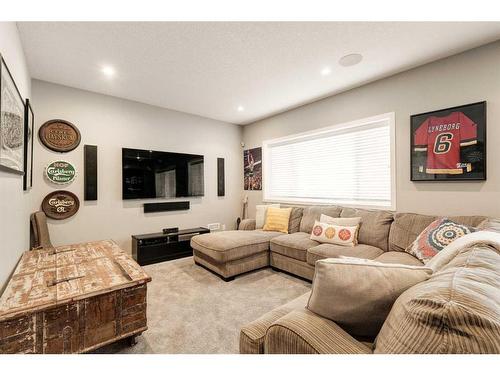 65 Auburn Springs Place Se, Calgary, AB - Indoor Photo Showing Living Room