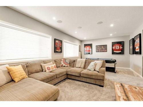 65 Auburn Springs Place Se, Calgary, AB - Indoor Photo Showing Living Room