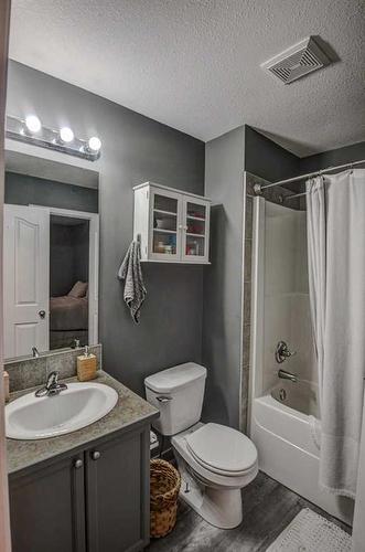 1202-2066 Luxstone Boulevard Sw, Airdrie, AB - Indoor Photo Showing Bathroom