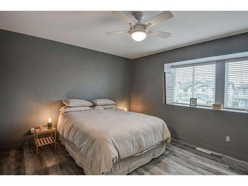 1202-2066 Luxstone Boulevard Sw, Airdrie, AB - Indoor Photo Showing Bedroom