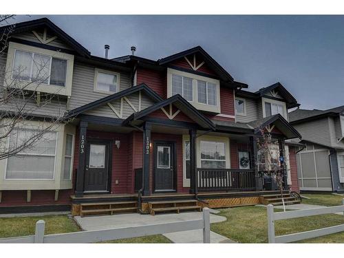 1202-2066 Luxstone Boulevard Sw, Airdrie, AB - Outdoor With Deck Patio Veranda With Facade