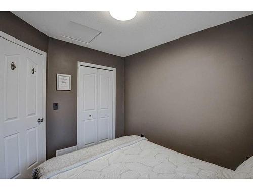 1202-2066 Luxstone Boulevard Sw, Airdrie, AB - Indoor Photo Showing Bedroom