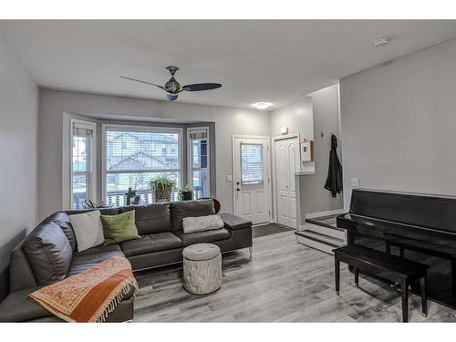 1202-2066 Luxstone Boulevard Sw, Airdrie, AB - Indoor Photo Showing Living Room