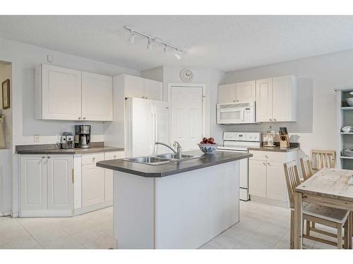 238 Citadel Meadow Grove Nw, Calgary, AB - Indoor Photo Showing Kitchen With Double Sink