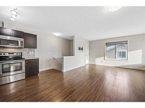 306-250 Sage Valley Road Nw, Calgary, AB - Indoor Photo Showing Kitchen With Stainless Steel Kitchen