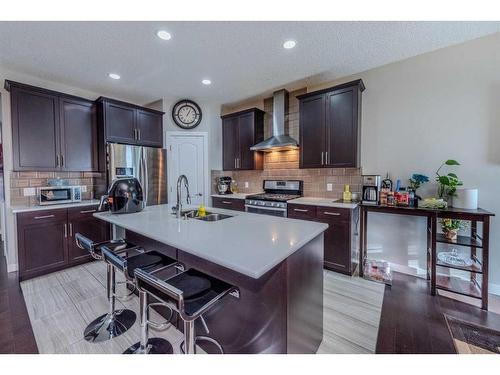 115 Savanna Parade Ne, Calgary, AB - Indoor Photo Showing Kitchen With Stainless Steel Kitchen With Double Sink With Upgraded Kitchen