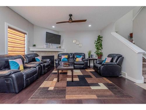 115 Savanna Parade Ne, Calgary, AB - Indoor Photo Showing Living Room With Fireplace