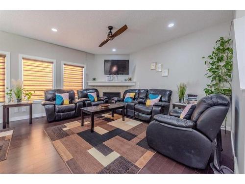 115 Savanna Parade Ne, Calgary, AB - Indoor Photo Showing Living Room With Fireplace