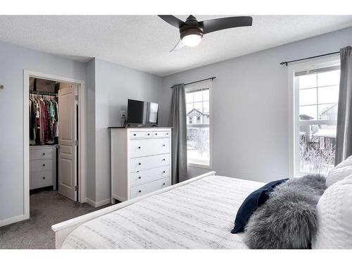 11 Reunion Grove Nw, Airdrie, AB - Indoor Photo Showing Bedroom