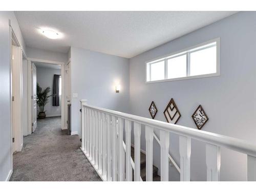 11 Reunion Grove Nw, Airdrie, AB - Indoor Photo Showing Other Room