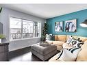 11 Reunion Grove Nw, Airdrie, AB  - Indoor Photo Showing Living Room 