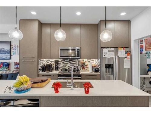 1333-76 Cornerstone Passage Ne, Calgary, AB - Indoor Photo Showing Kitchen With Double Sink With Upgraded Kitchen