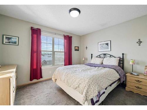 62 Cranberry Close Se, Calgary, AB - Indoor Photo Showing Bedroom