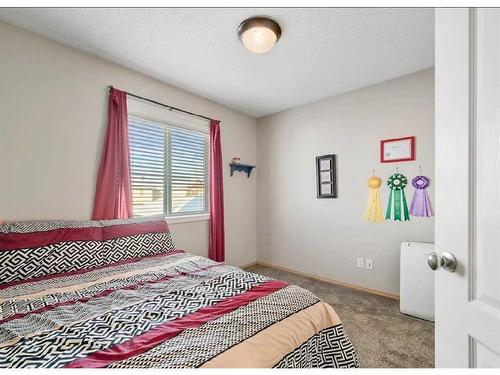 62 Cranberry Close Se, Calgary, AB - Indoor Photo Showing Bedroom