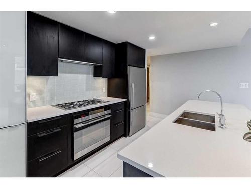 2502-1111 10 Street Sw, Calgary, AB - Indoor Photo Showing Kitchen With Double Sink With Upgraded Kitchen