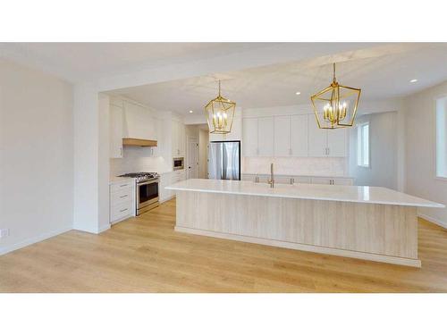 44 Sugarsnap Way Se, Calgary, AB - Indoor Photo Showing Kitchen With Upgraded Kitchen