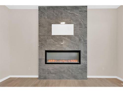 309 Corner Glen Way Ne, Calgary, AB - Indoor With Fireplace