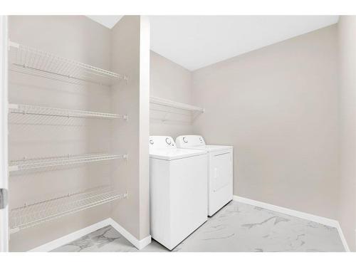 309 Corner Glen Way Ne, Calgary, AB - Indoor Photo Showing Laundry Room