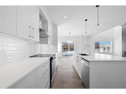 6 Crimson Ridge Cove Nw, Calgary, AB - Indoor Photo Showing Kitchen With Stainless Steel Kitchen With Upgraded Kitchen