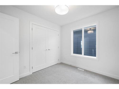 6 Crimson Ridge Cove Nw, Calgary, AB - Indoor Photo Showing Other Room