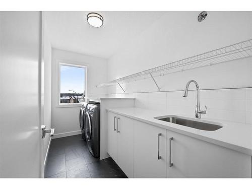 6 Crimson Ridge Cove Nw, Calgary, AB - Indoor Photo Showing Laundry Room