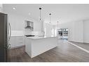 6 Crimson Ridge Cove Nw, Calgary, AB  - Indoor Photo Showing Kitchen With Stainless Steel Kitchen With Upgraded Kitchen 