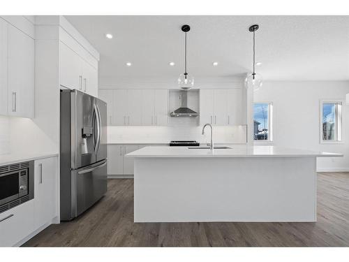 6 Crimson Ridge Cove Nw, Calgary, AB - Indoor Photo Showing Kitchen With Stainless Steel Kitchen With Upgraded Kitchen