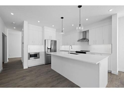 6 Crimson Ridge Cove Nw, Calgary, AB - Indoor Photo Showing Kitchen With Stainless Steel Kitchen With Upgraded Kitchen