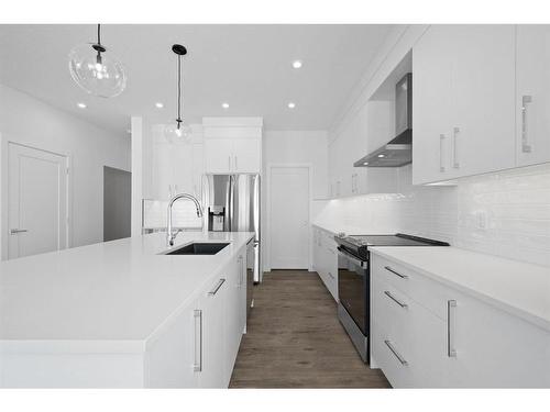 6 Crimson Ridge Cove Nw, Calgary, AB - Indoor Photo Showing Kitchen With Stainless Steel Kitchen With Upgraded Kitchen