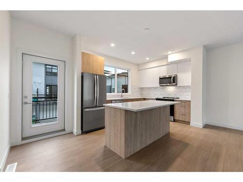 511-857 Belmont Drive Sw, Calgary, AB - Indoor Photo Showing Kitchen With Stainless Steel Kitchen With Upgraded Kitchen