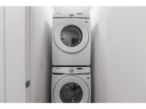 511-857 Belmont Drive Sw, Calgary, AB - Indoor Photo Showing Laundry Room