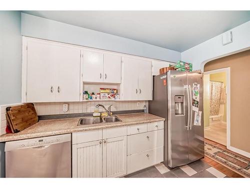 1735 19 Avenue Nw, Calgary, AB - Indoor Photo Showing Kitchen With Double Sink