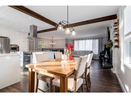 251 Queen Charlotte Way Se, Calgary, AB - Indoor Photo Showing Dining Room