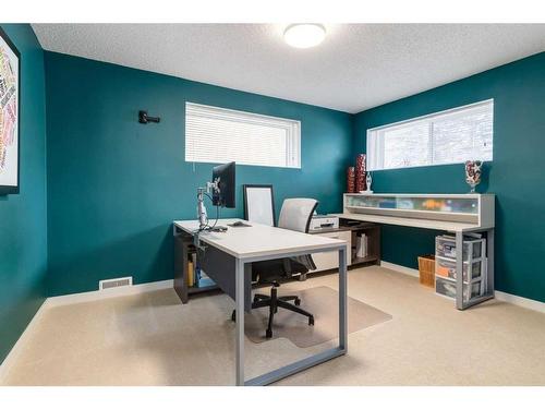 251 Queen Charlotte Way Se, Calgary, AB - Indoor Photo Showing Office