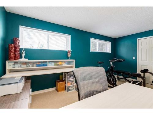 251 Queen Charlotte Way Se, Calgary, AB - Indoor Photo Showing Office