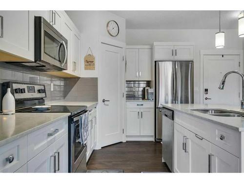 206-20 Walgrove Walk Se, Calgary, AB - Indoor Photo Showing Kitchen With Stainless Steel Kitchen With Double Sink With Upgraded Kitchen