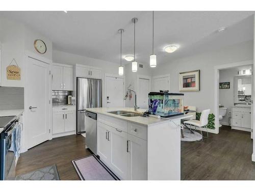 206-20 Walgrove Walk Se, Calgary, AB - Indoor Photo Showing Kitchen With Stainless Steel Kitchen With Double Sink With Upgraded Kitchen