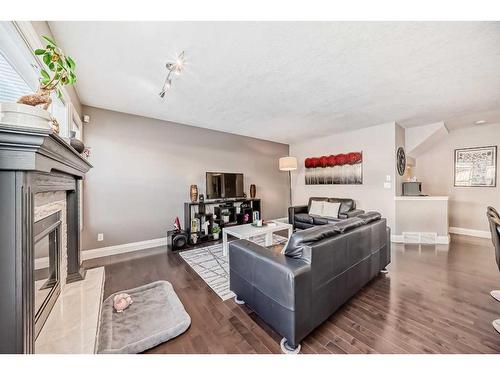 279 Springborough Way Sw, Calgary, AB - Indoor Photo Showing Living Room