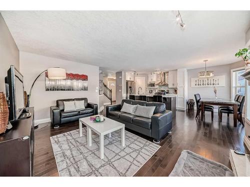 279 Springborough Way Sw, Calgary, AB - Indoor Photo Showing Living Room