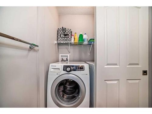 279 Springborough Way Sw, Calgary, AB - Indoor Photo Showing Laundry Room