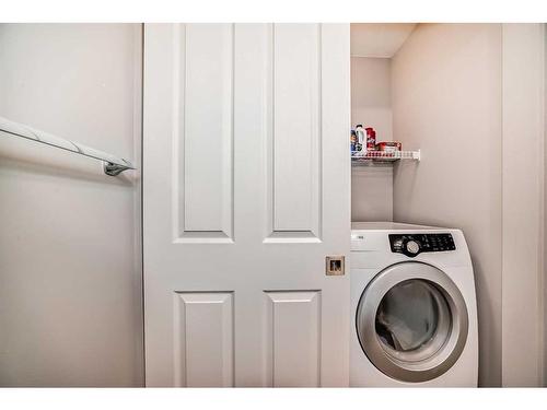 279 Springborough Way Sw, Calgary, AB - Indoor Photo Showing Laundry Room