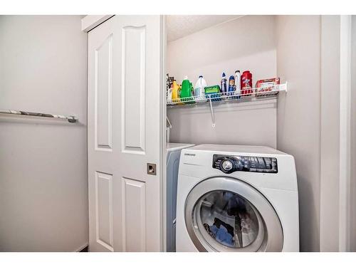 279 Springborough Way Sw, Calgary, AB - Indoor Photo Showing Laundry Room